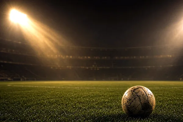 A football pitch at night on the Crore Bet sports page.